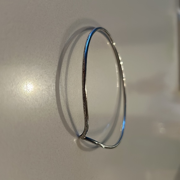 Sterling silver bangle with a chevron shape for a more delicate look. - Picture 2 of 3